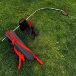 Supporto con zaino defaticatore per tagliasiepi